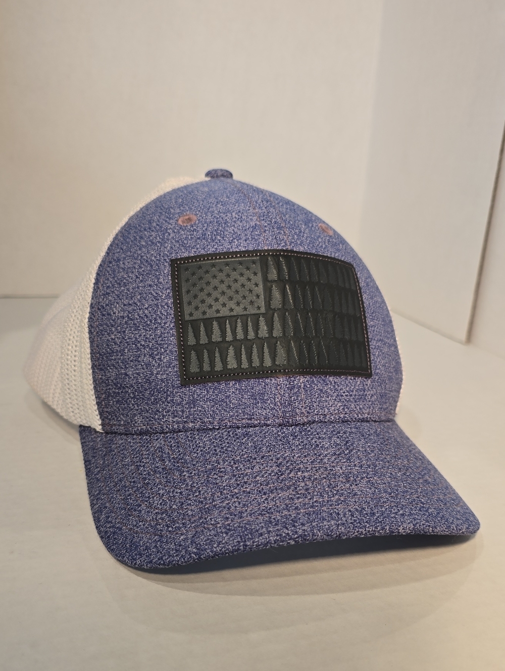 Columbia Blue and White Mesh Back Trucker Hat with Black Patch